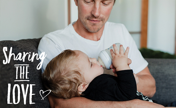 One great way dads can bond with their newborn baby is by sharing feeding time.